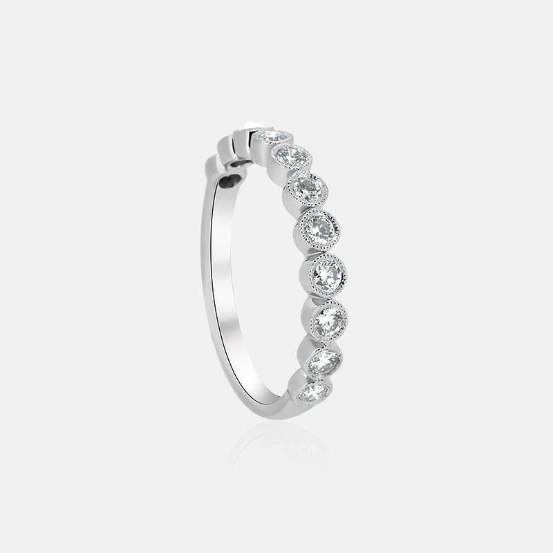 Bezel set round diamond wedding ring with migraine beading