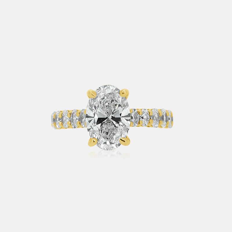 Oval engagement ring with ovals in the band