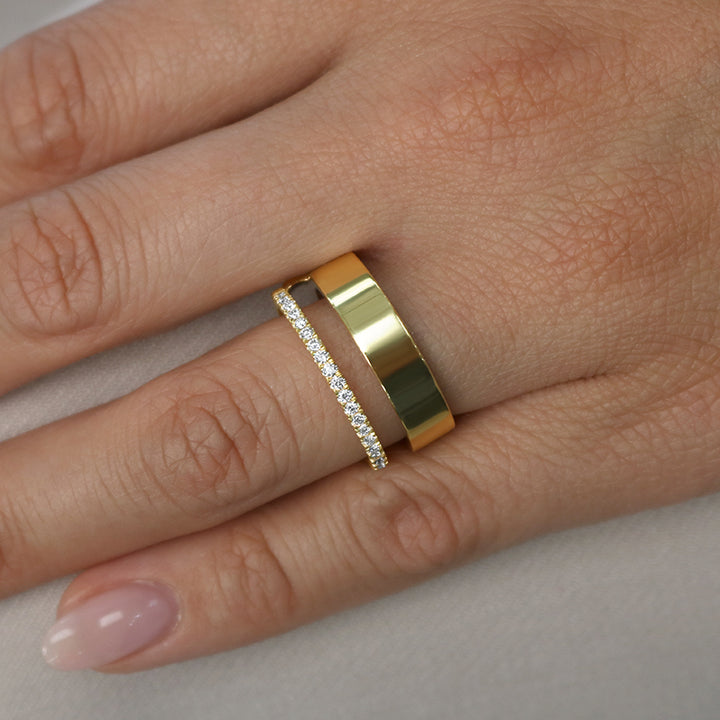 Modern Negative Space Cigar Band in 14 Karat Yellow Gold with .22 Carat of Diamonds