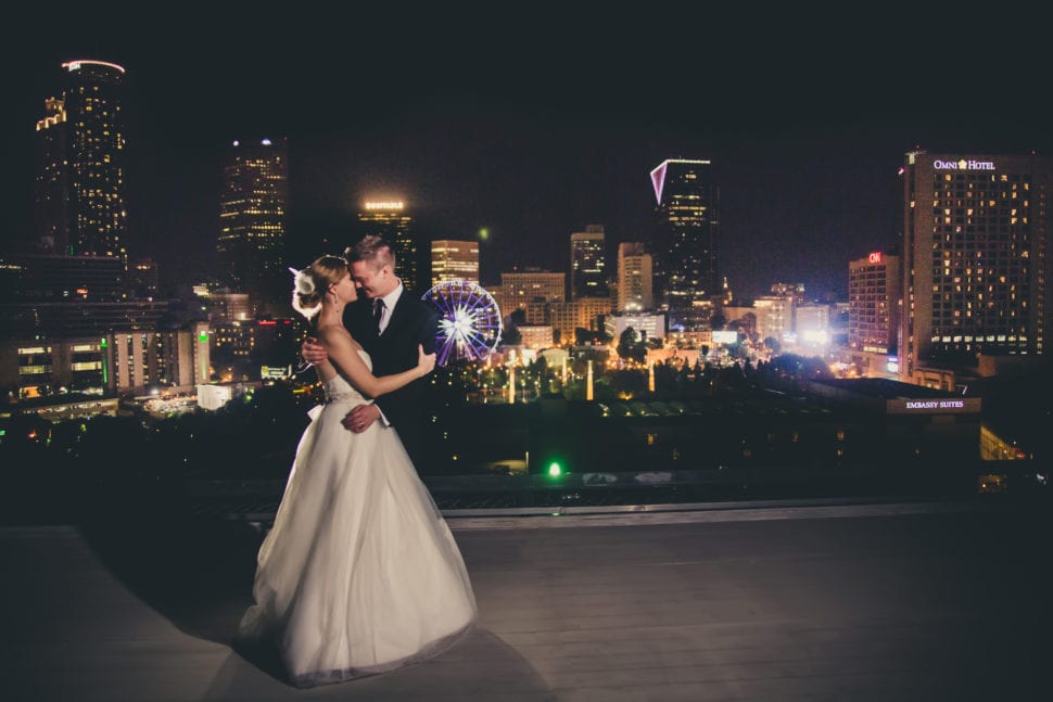 Masina Diamonds couple at Ventanas wedding venue with Atlanta skyline.