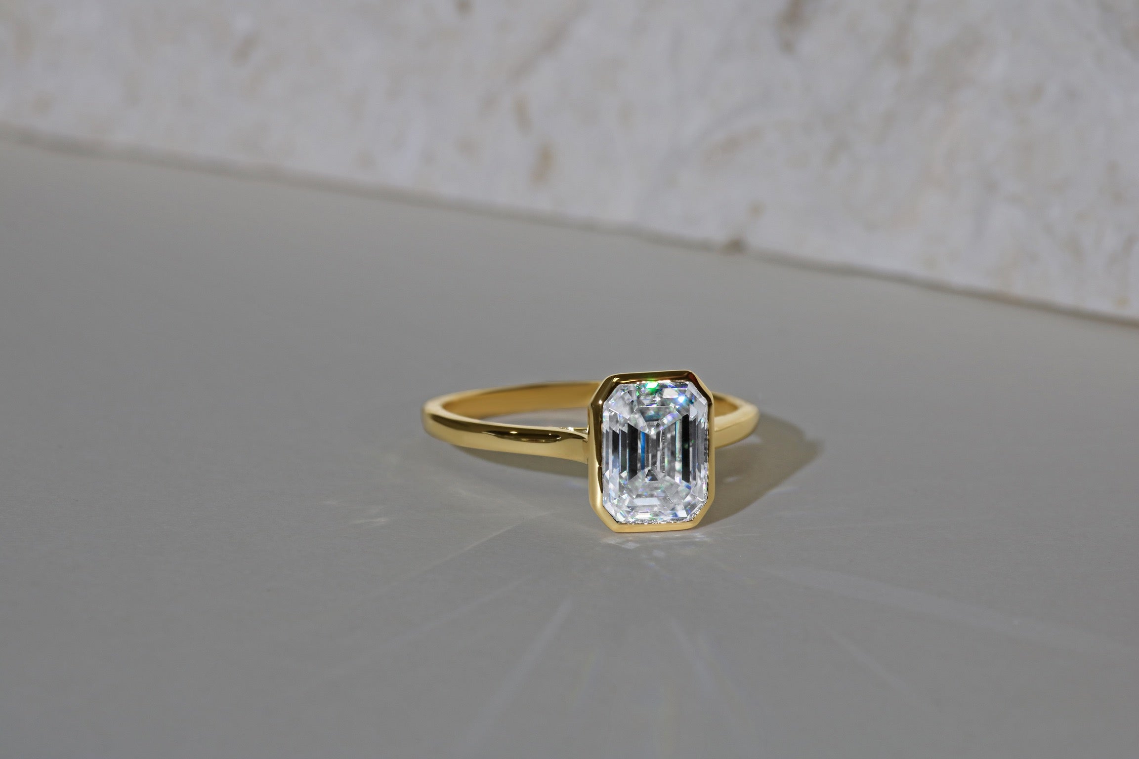 Masina Diamonds: Emerald-cut diamond engagement ring.