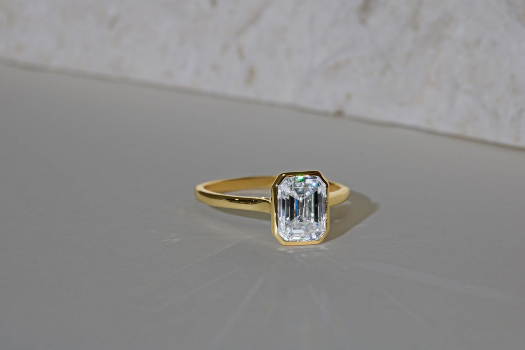 Masina Diamonds gold ring with emerald cut diamond.