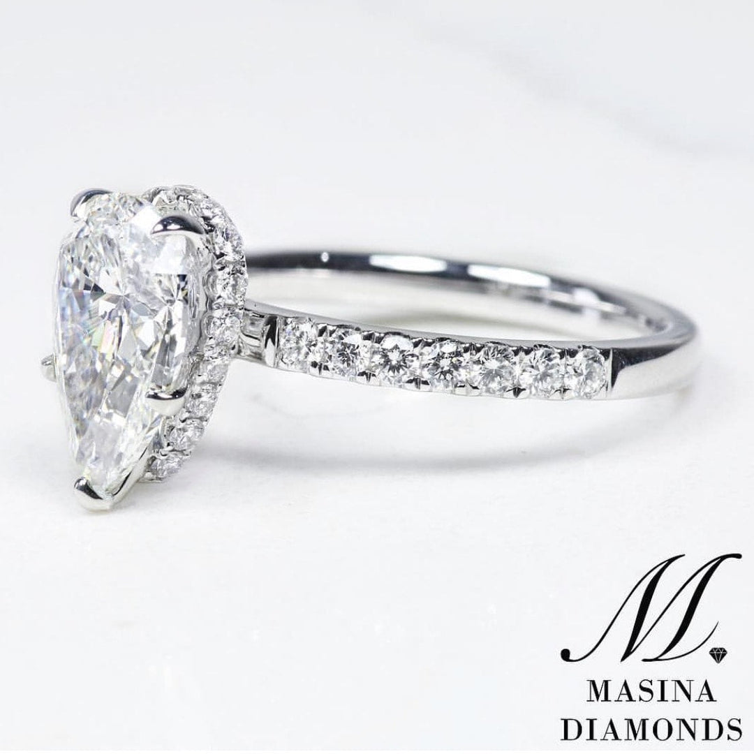 Pear cut diamond ring, white gold.