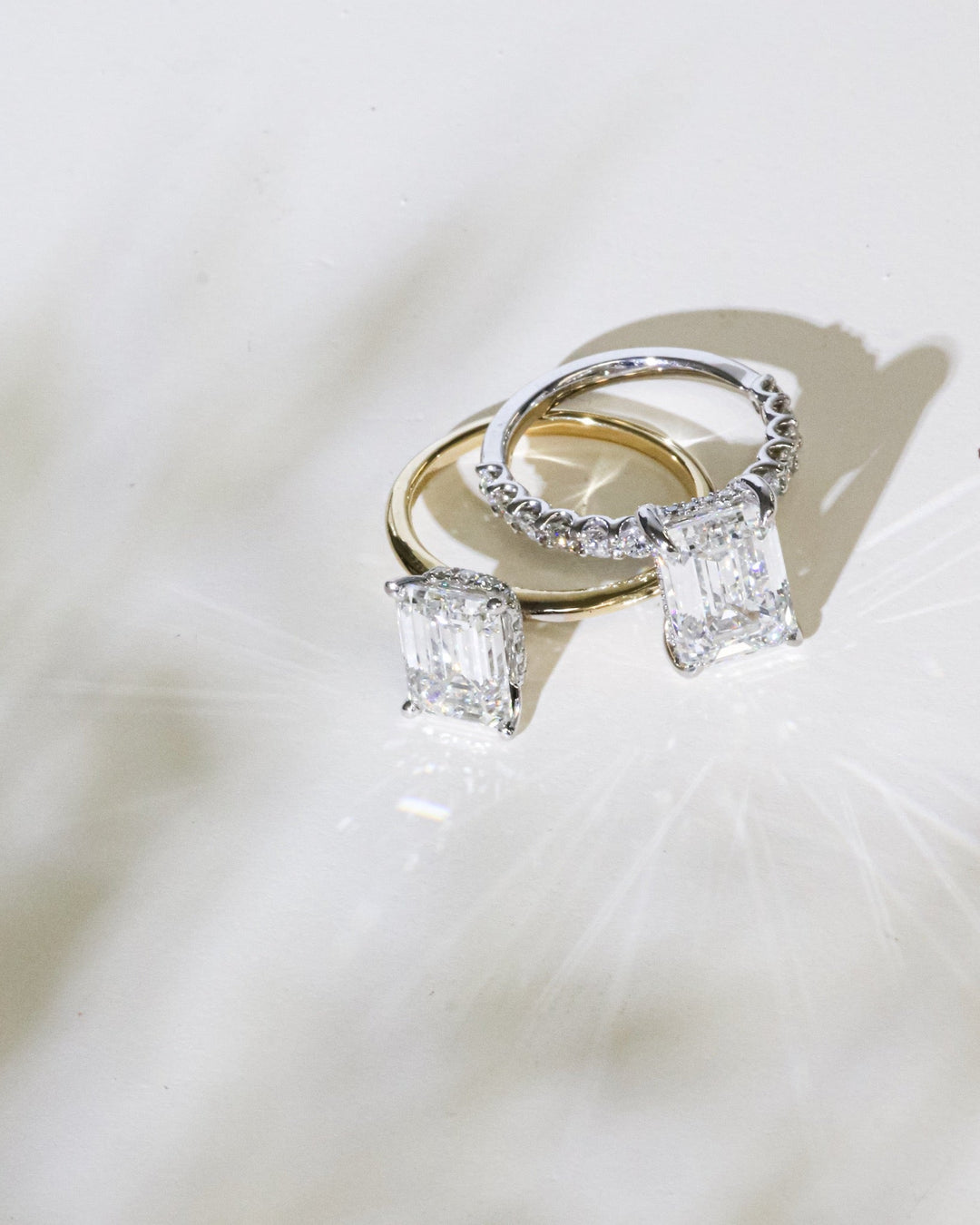 Masina Diamonds: Mixed metal emerald cut engagement rings