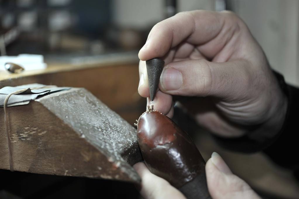Diamond ring setting being crafted.