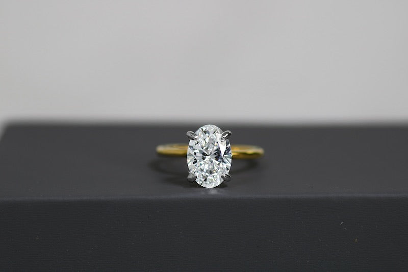Oval diamond ring for article on natural versus lab-grown diamonds.