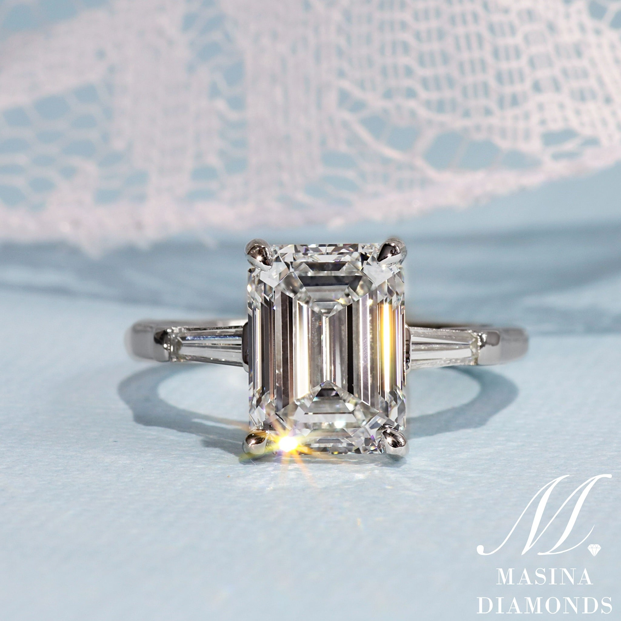 Emerald cut diamond engagement ring