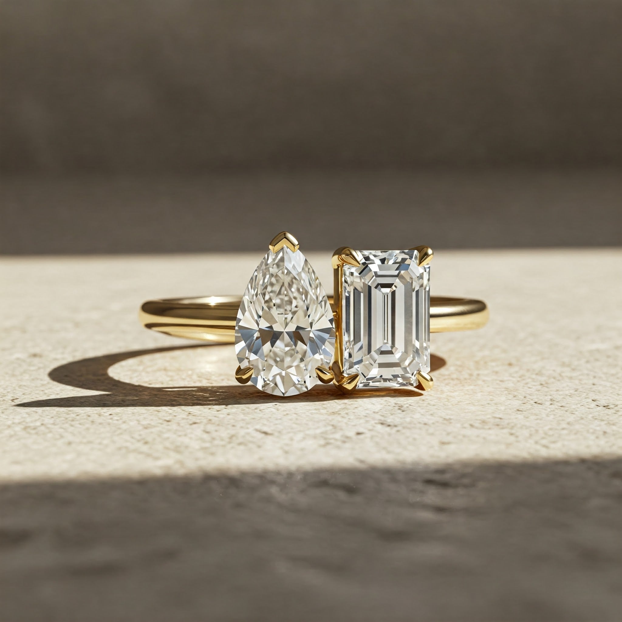 custom pear shaped and bagguete diamond cut toi et Moi engagement ring