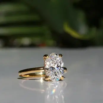 Oval cut solitaire diamond engagement ring from Masina Diamonds.