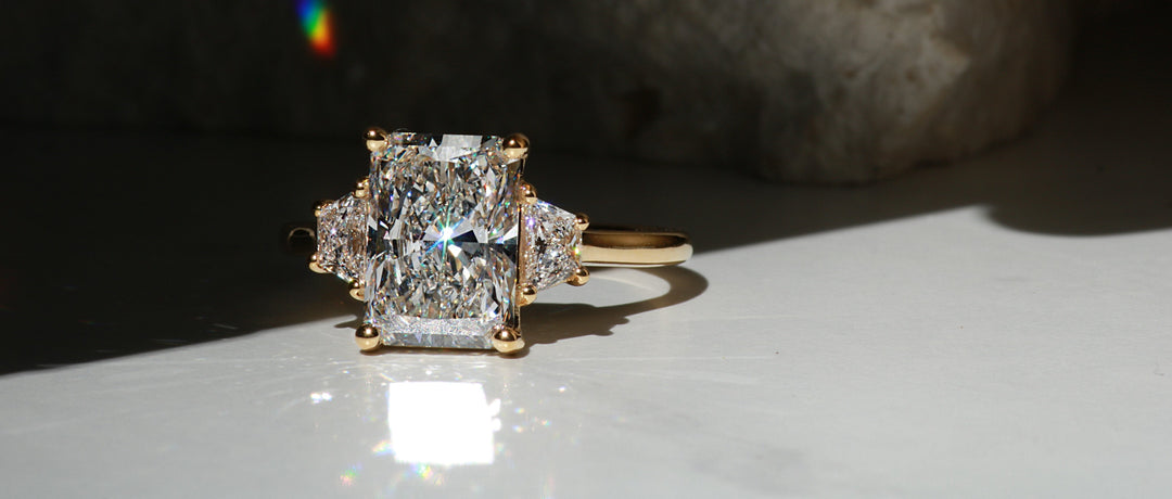 Radiant-cut diamond ring, a symbol of lasting love.