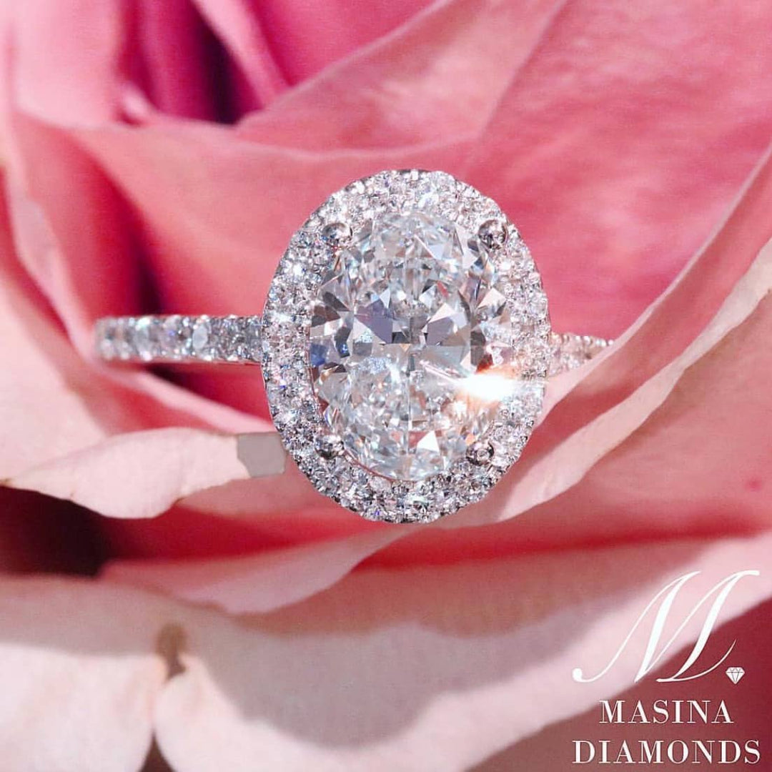 Oval diamond halo engagement ring
