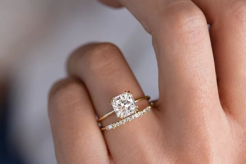 Cushion cut diamond engagement ring and wedding band