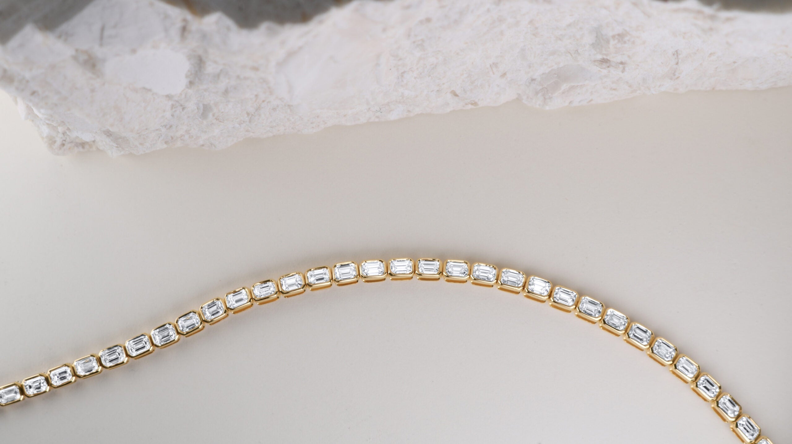 Masina Diamonds gold bracelet with emerald cut diamonds.