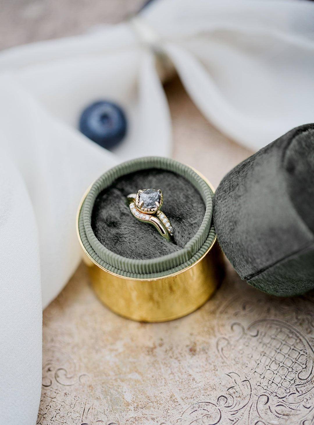 Gold diamond engagement ring in velvet box