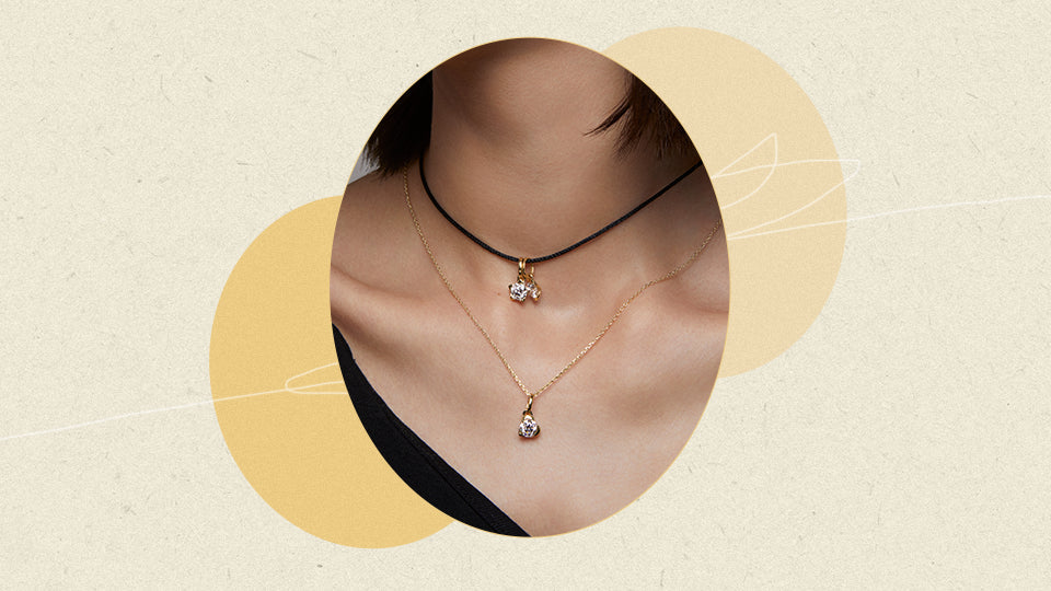 Delicate layered diamond pendant necklaces.