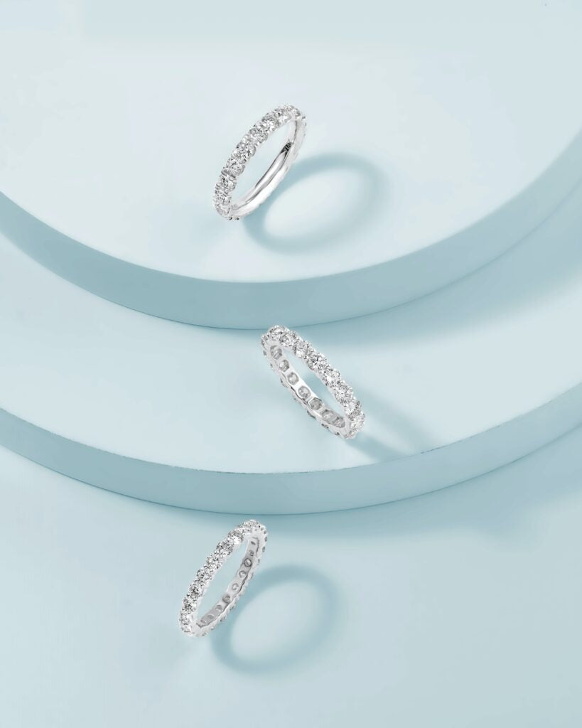 Silver diamond eternity rings.