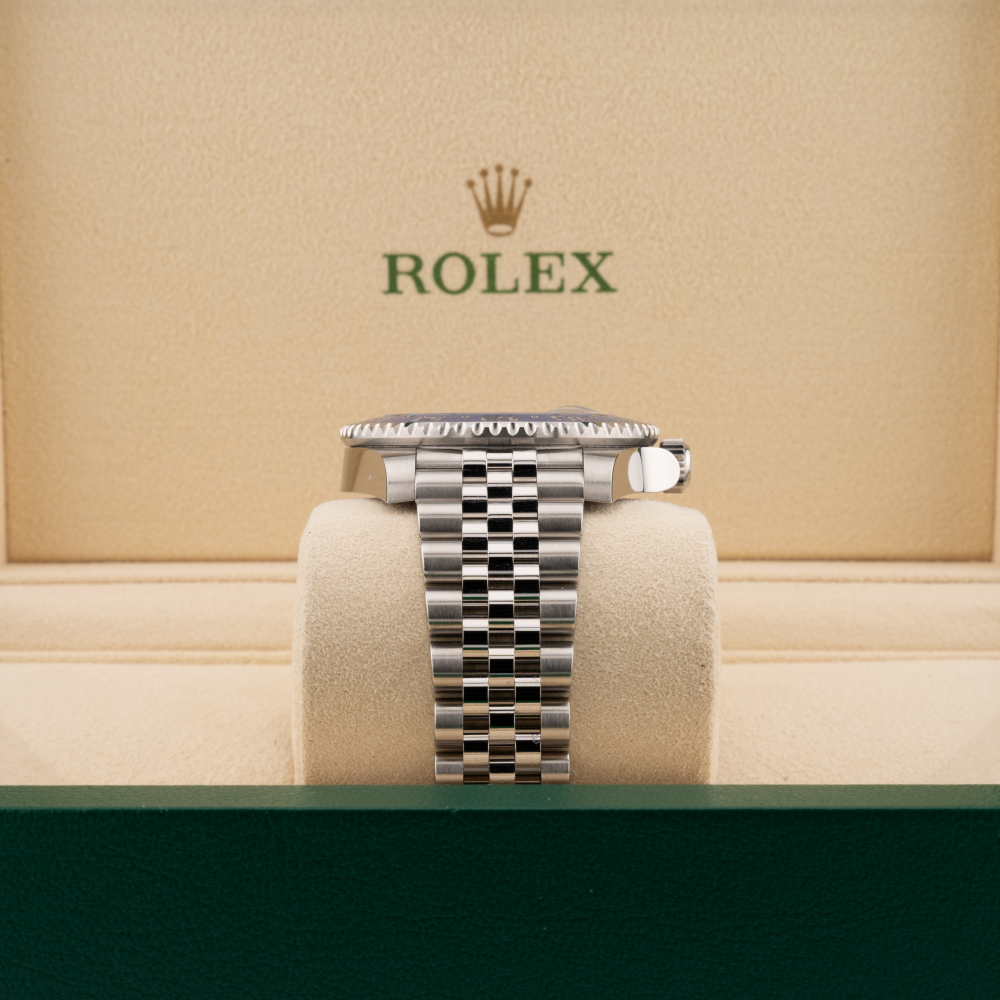 Rolex batman 126710 jubilee band in a beige box