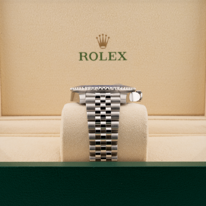 Rolex batman 126710 jubilee band in a beige box