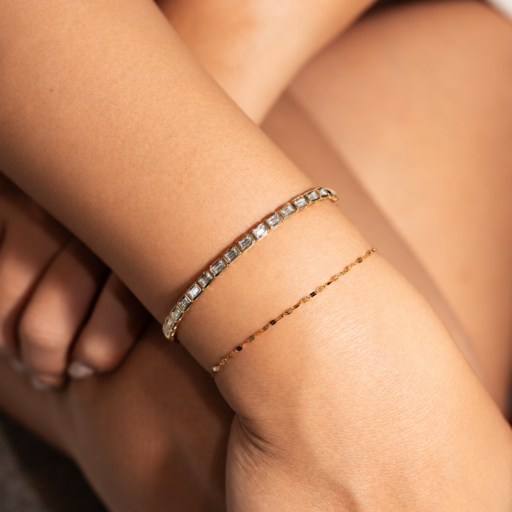 emerald cut diamond bezel set bangle 