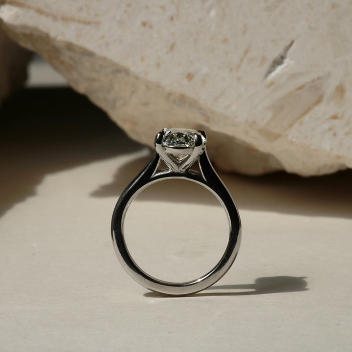 Cathedral oval diamond engagement ring