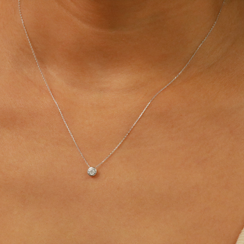 Effortless Elegance: 18K White Gold Bezel Diamond Pendant Necklace