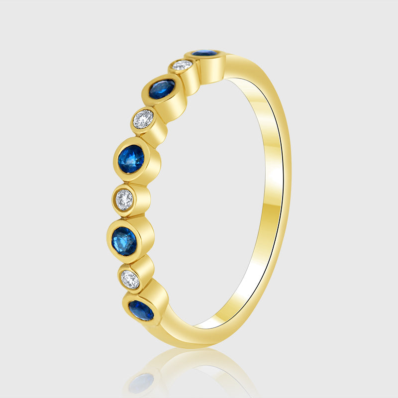 sapphire and diamond wedding ring in yellow gold
