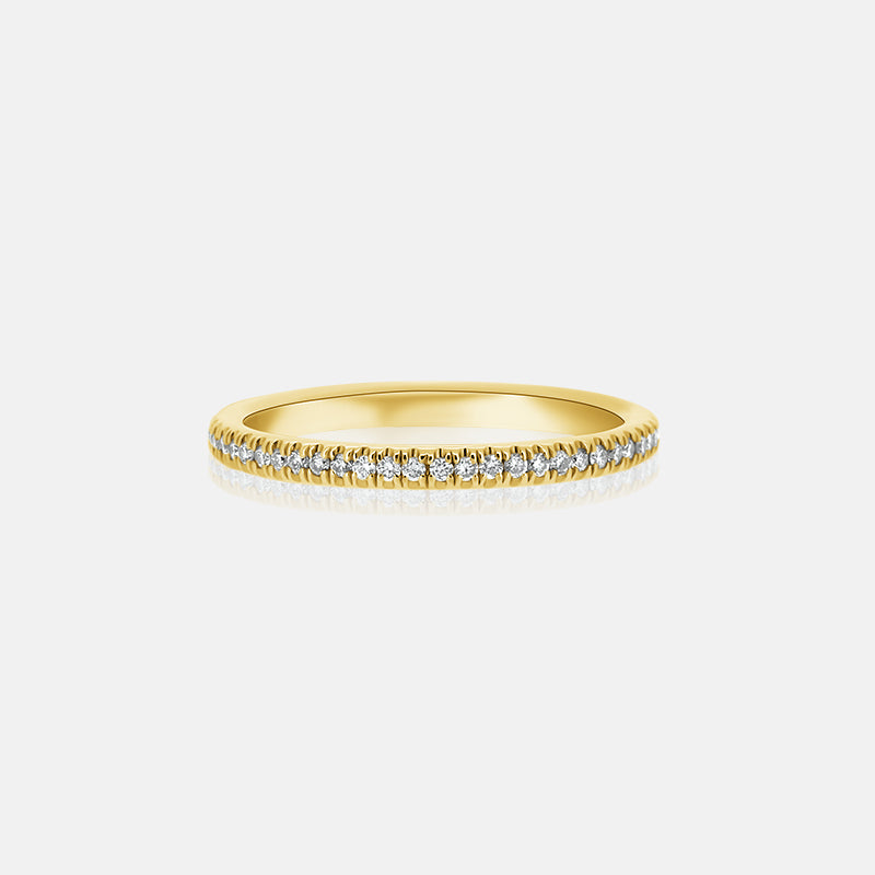 pave diamond wedding band in yellow gold