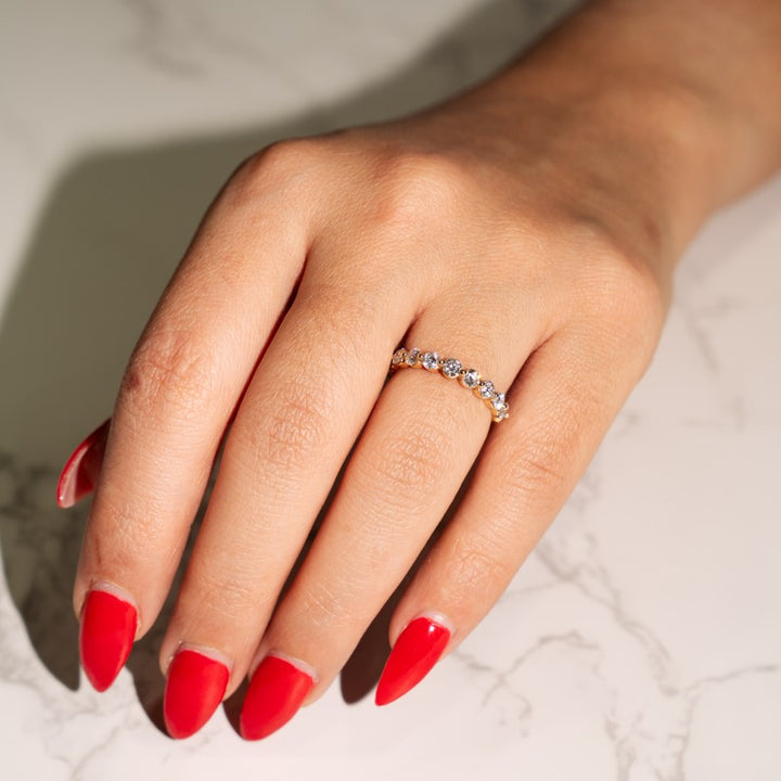 Shared prong wedding band in 14k yellow gold with 1.00 carat of diamonds