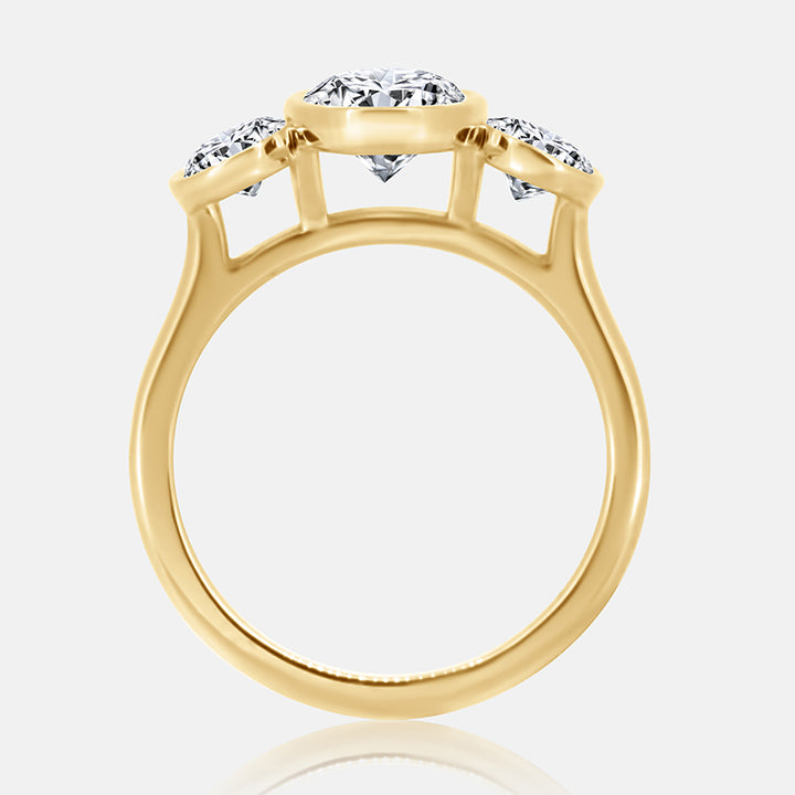 Three stone oval diamond bezel set engagement ring
