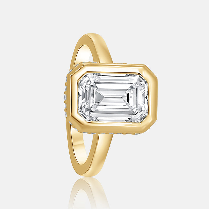 bezel set emerald cut engagement ring