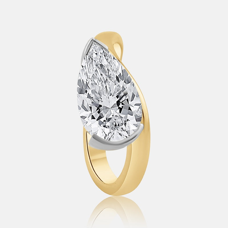 Eas West pear shape engagement ring on a contour band in 14 karat yellow gold 