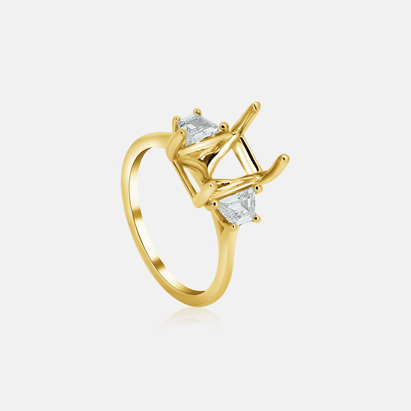 three stone engagement ring with trapezoid side stones in yellow gold