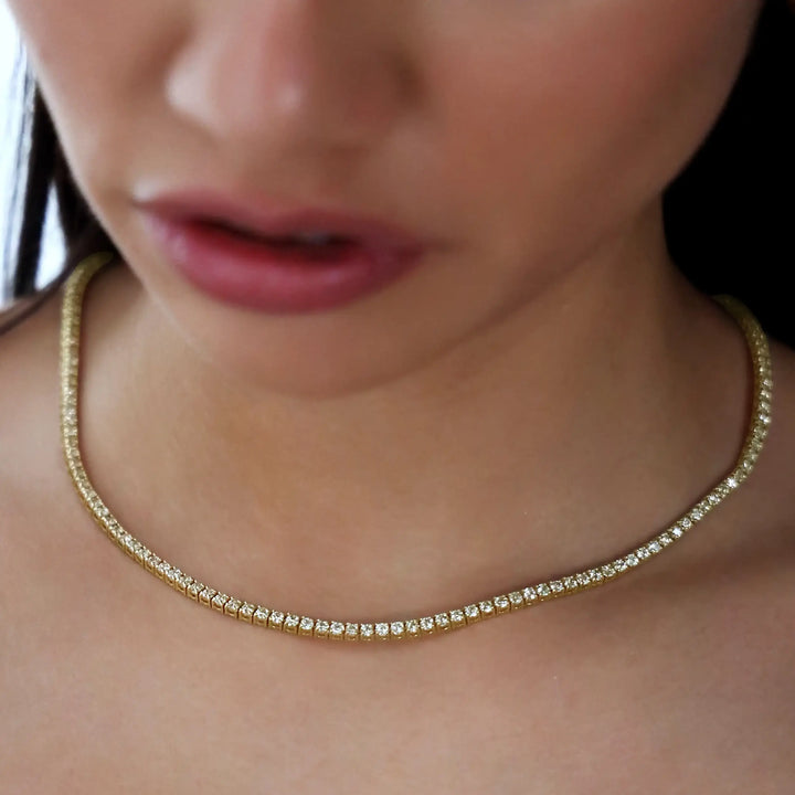 Tennis Necklace in 14K yellow gold with 7.57 carats of diamonds