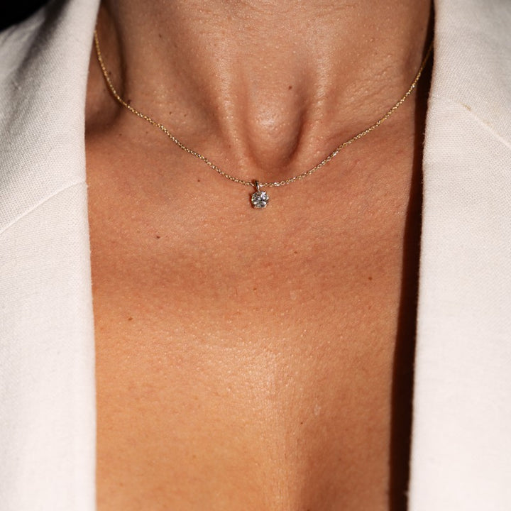 Solitaire Diamond Pendant in 14K Yellow Gold with a .57ct round diamond