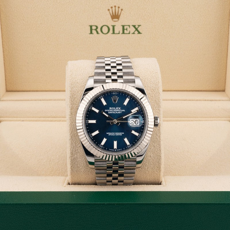 Rolex 126334 Blue Dial on a jubilee band displayed in a beige rolex box 