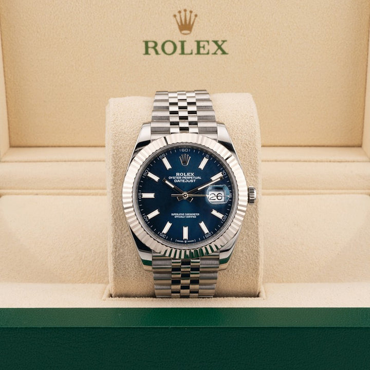 Rolex 126334 Blue Dial on a jubilee band displayed in a beige rolex box 