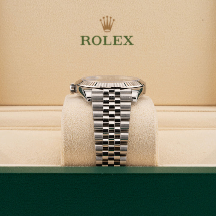 Rolex 126334 Blue Dial displayed the jubilee band in a beige rolex box 