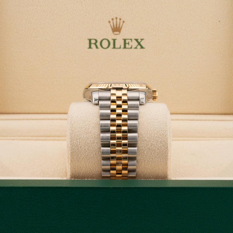Rolex Datejust 116233 pyramid dial two tone watch jubilee band in a beige rolex watch