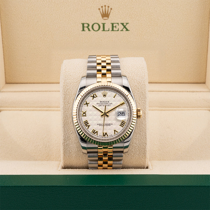 Rolex Datejust 116233 pyramid dial two tone watch in a beige rolex watch