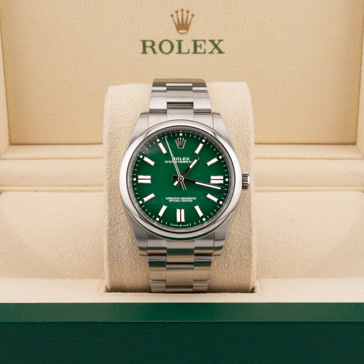 Rolex 124300 Green Dial Oyster perpetual displayed in a Rolex beige box 