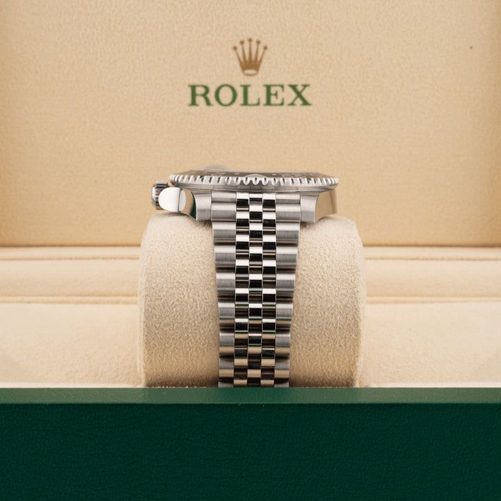 Rolex 126710GRNR jubilee band displayed in a rolex box
