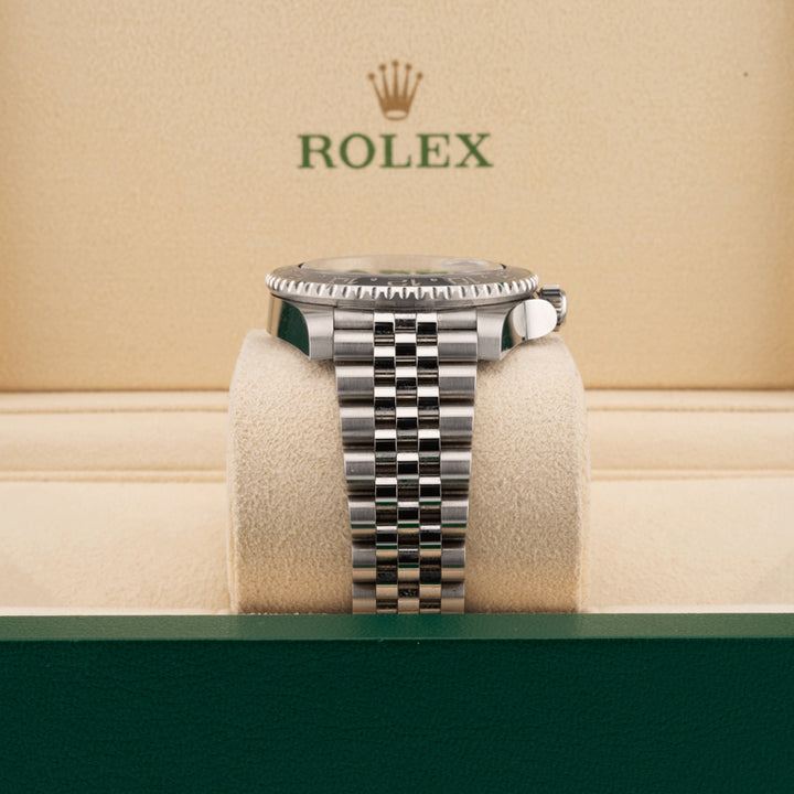 Rolex 126710GRNR bruce wayne on a jubilee band displayed in a rolex box