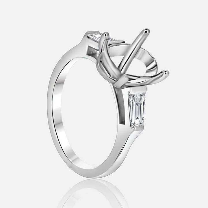 Three stone Engagement Ring with .70 carats of tapered baguettes in 14K White Gold