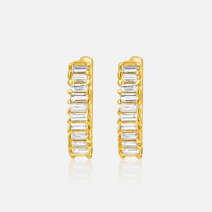 18K yellow gold baguette huggies set east to west with .31 carat of diamonds