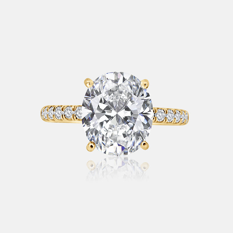 Solitaire Engagement Ring with .30 carats of pave round diamond in 14 Karat Yellow Gold