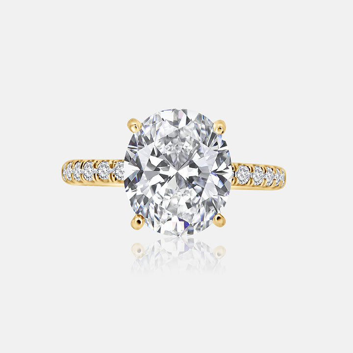 Solitaire Engagement Ring with .30 carats of pave round diamond in 14 Karat Yellow Gold