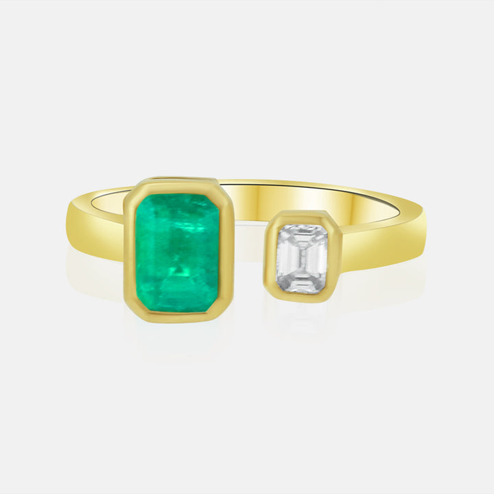 14k Yellow Gold Double Bezel set ladies band with a 1.14ct Emerald and a .21ct Emerald Cut Diamond