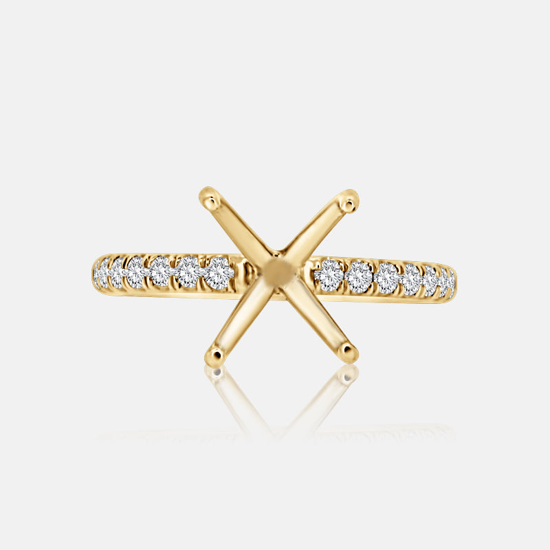Solitaire Engagement Ring with .30 carats of pave round diamond in 14 Karat Yellow Gold