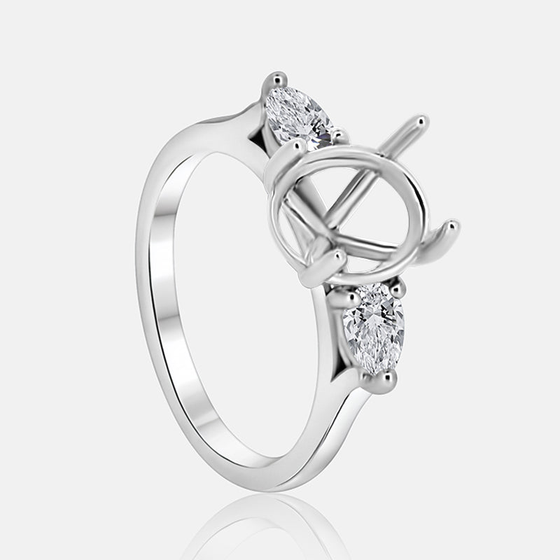 Three stone Engagement Ring with .52 carats of pear shape diamonds in 14 karat white gold
