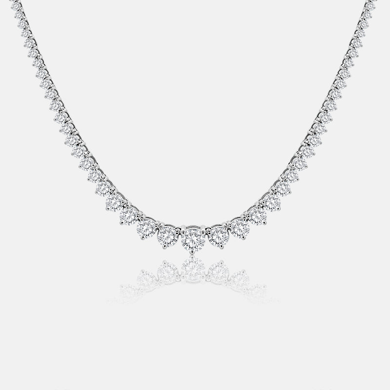 Graduating tennis necklace with 9.62 carats of round diamonds in 14 Karat White Gold